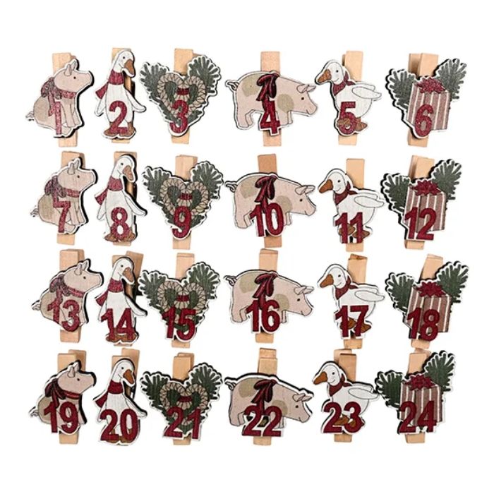 Klemmen voor de pakkekalender met kerstfiguren Det Gamle Apotek